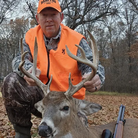 Hunter pictured with harvested deer.