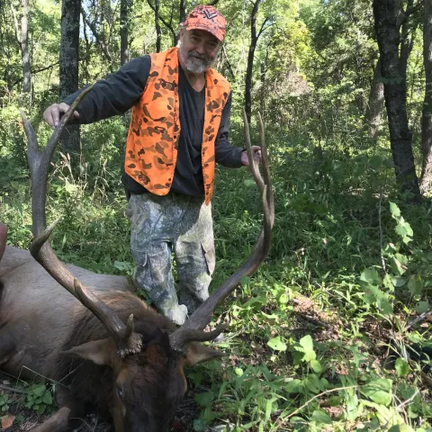 Man with elk