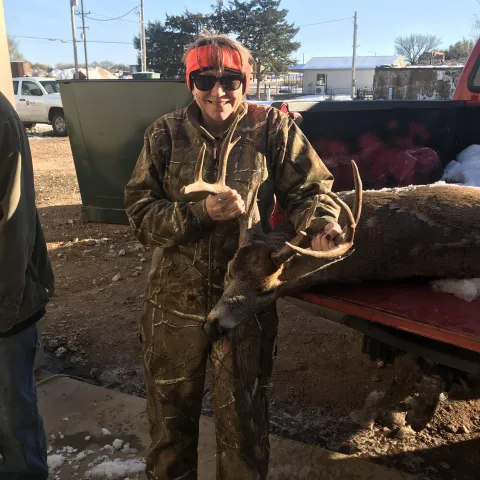 Hunter pictured with harvested deer.