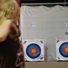 Student shooting at National Archery in the Schools Program target.