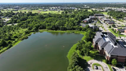 A drone shot of the Bickham-Rudkin park pond showing the fish attractors.
