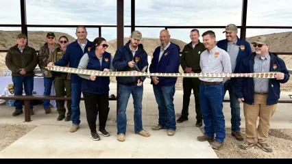 ribbon cutting at Optima shooting range