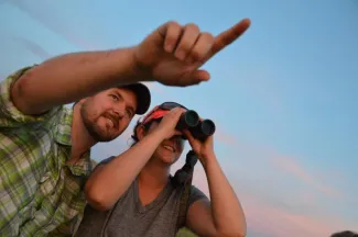 The Wildlife Department's annual Selman Bat Watch gives viewers a chance to see hundreds of thousands of Mexican free-tailed bats emerge from a cave to feed. (Blake Podhajsky/ODWC)