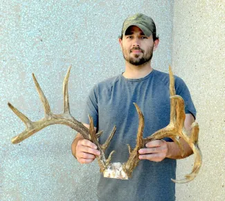 Mark Hurley of Norman holds the nontypical rack that scored 182 2/8, which he took during the 2016-17 archery season. He is eligible for listing in the Cy Curtis Awards Program  and Pope & Young registry. (DON P. BROWN / ODWC)