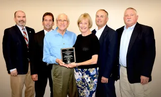 Recognizing the 2018 Landowner Conservationist of the Year winners are, from left, ODWC Director J.D. Strong, Jeff Pennington, Fred and Randi Wightman, ODWC Assistant Director Wade Free, and ODWC Chief of Wildlife Alan Peoples.