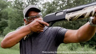 Man shooting shotgun.  Photo courtesy of National Shooting Sports Foundation (NSSF.org)
