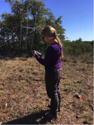 Woman conducting quail research 