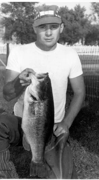O.J. Stone holding state record spotted bass.