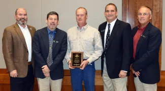 Gathered for the 2020 Wildlife Biologist of the Year presentation are, from left, ODWC Director J.D. Strong, Wildlife Assistant Chief Russ Horton, Wildlife Biologist Thad Potts, Wildlife Chief Bill Dinkines, and ODWC Assistant Director Wade Free. (Don P. Brown/ODWC)