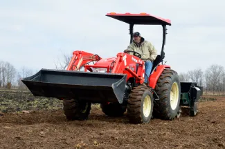 The Berg on a tractor.