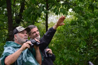 Wildlife watchers in the field.