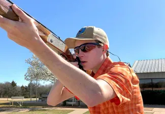 Adam Dryer legendary ODWC intern shows off how to shoot a shotgun.