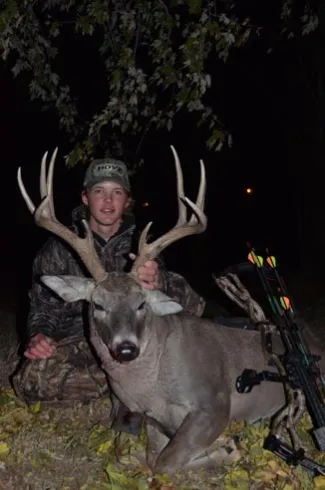 Youth boy with buck.