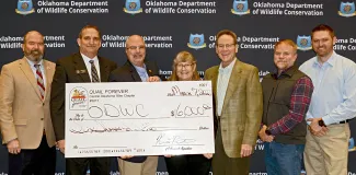 Gathered for a $6,000 donation from Quail Forever Central Oklahoma 89'er Chapter are, from left, ODWC Director J.D. Strong, Wildlife Chief Bill Dinkines, chapter President Troy Ellefson, QF state representative Laura McIver, Chapter members James Dietsch and Kevin Bennett; and ODWC Upland Game Biologist Tell Judkins (Photo: Don P. Brown/ODWC)