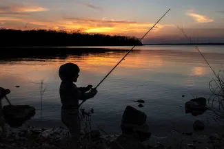 Boy fishing at Thunderbird lake.  Photo by Michael Bryan/RPS 2021
