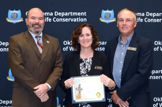Andrea Crews (center) with Spirit of ODWC 2021.  Director JD Strong (left) and Assistant Director Wade Free (right) on the side.