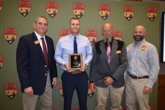 ODWC Wildlife Chief Bill Dinkines, left, Wildlife Technician Zeke Hawkes, Wildlife Assistant Chief Scott Parry and NE Region Wildlife Supervisor Matt Mattioda.