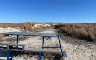 Optima WMA shooting range before constructions. The bench is worn down and the range is overgrown.