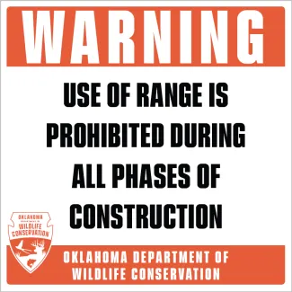 A sign saying "Warning: Use of range is prohibited during all phases of construction"