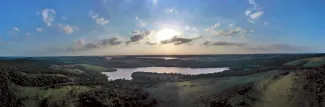 A panoramic view of Bluestem Lake at Atoka WMA from above.