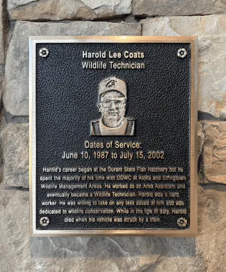A plaque honoring Harold Coats.